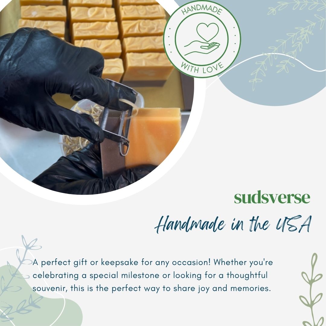 Handmade soap bars with a gloved hand and 'sudsverse' branding on a light blue background.